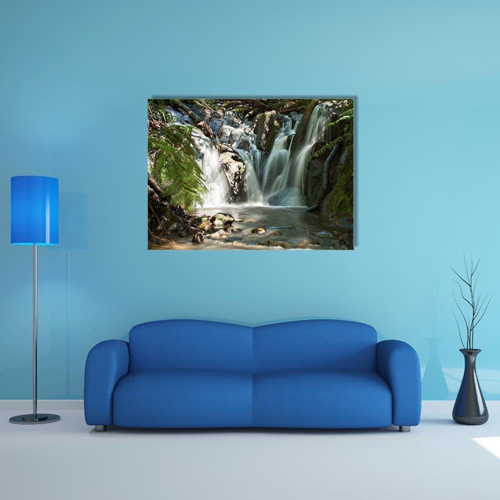 Olinda Falls Near Melbourne Canvas Wall Art in white, gray and green, single panel hung on a wall