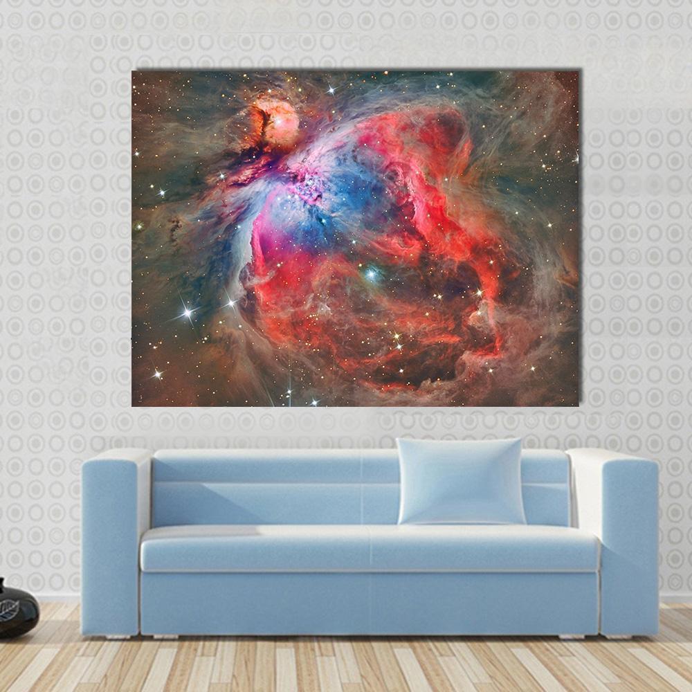 Orion Nebula Canvas Wall Art in black, red and blue, single panel hung on a wall