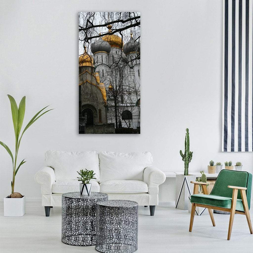 Russian Orthodox Church in Winter Vertical Canvas Wall Art in white, gray and gold, single vertical panel hung on a wall