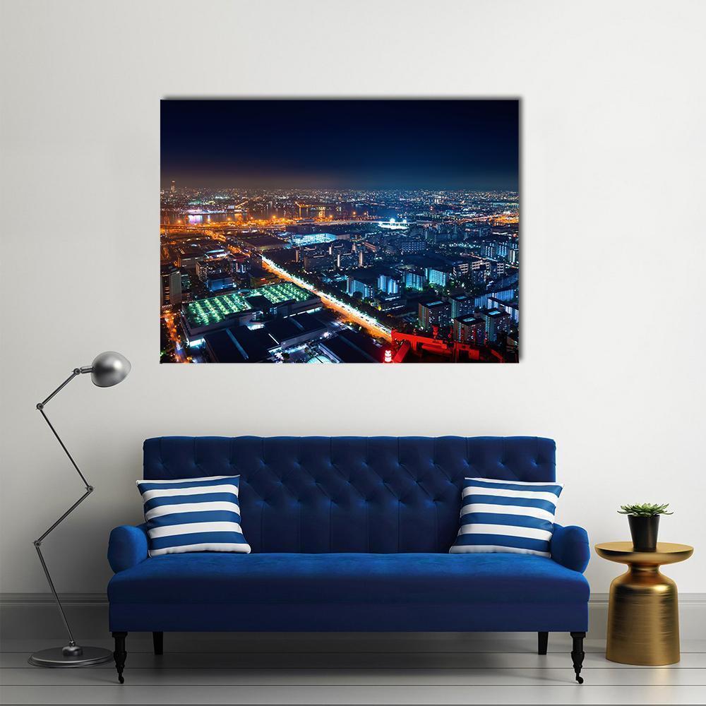 Osaka Bay Harbor at Night Canvas Wall Art in black, orange and blue, single panel hung on a wall