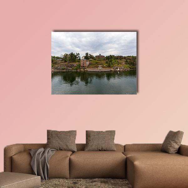 Oscar Fredriksborgs Fortification on Island Canvas Wall Art in gray, green and blue, single panel hung on a wall