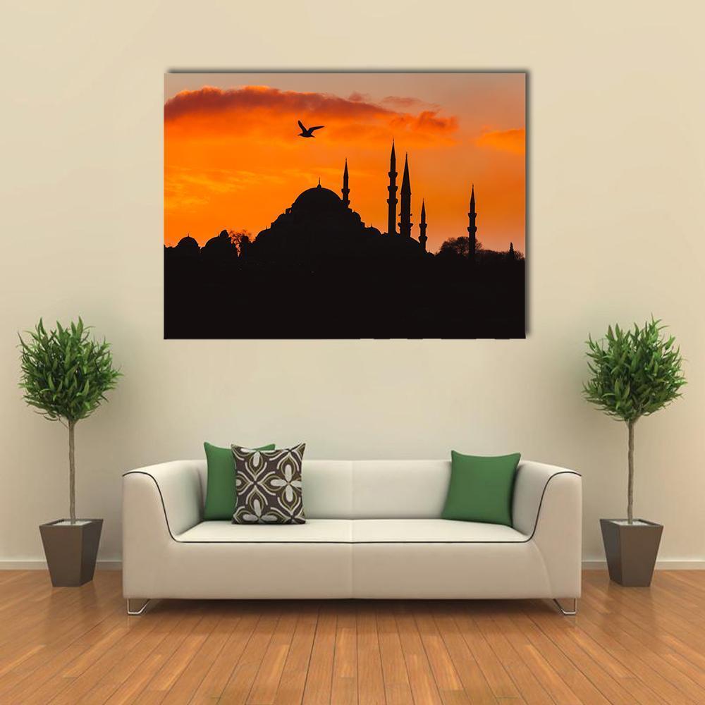 Ottoman Imperial Mosque at Dusk Canvas Wall Art in black and orange, single panel hung on a wall