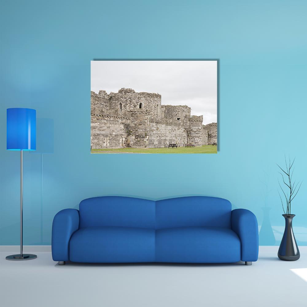 Outer Walls of Beaumaris Castle Canvas Wall Art in white, gray and green, single panel hung on a wall
