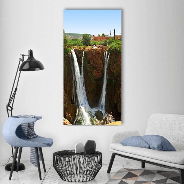 Ouzoud Falls, Morocco Vertical Canvas Wall Art in brown, green and blue, single vertical panel hung on a wall