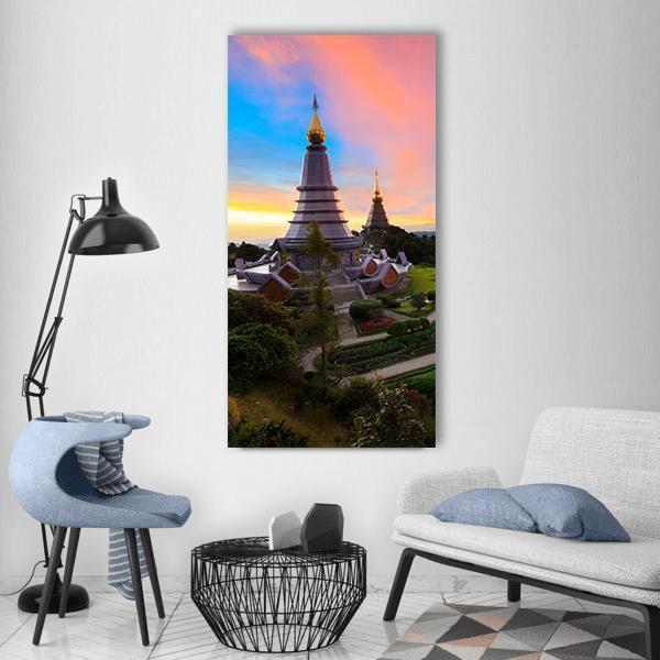 Pagoda Nabhapolbhumisir at Sunset, Doi Inthanon Vertical Canvas Wall Art in orange, blue and pink, single vertical panel hung on a wall