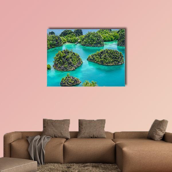 Painemo Island in Indonesia Canvas Wall Art in green and blue, single panel hung on a wall
