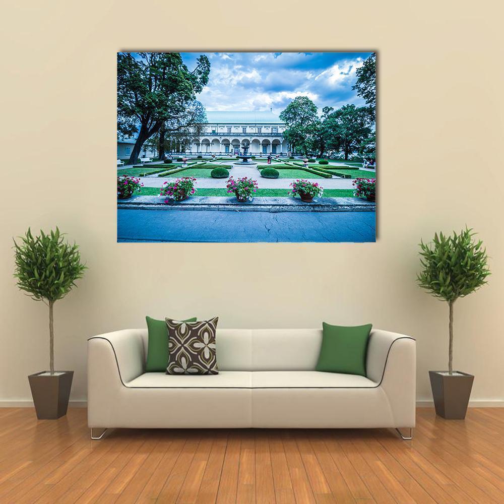 Queen Anne Palace Garden, Prague Canvas Wall Art in white, green and blue, single panel hung on a wall