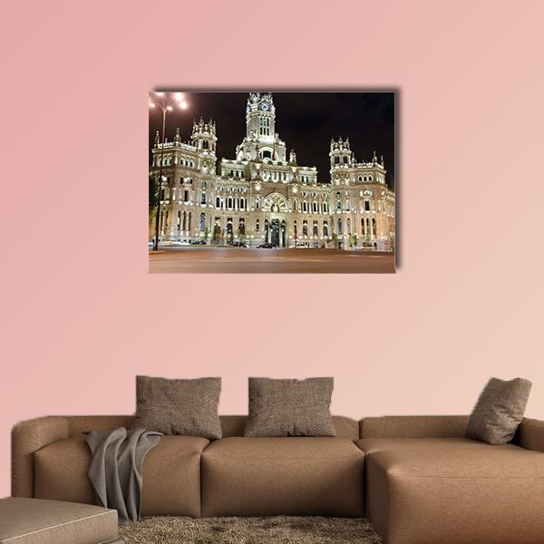 Palacio De Cibeles at Night Canvas Wall Art in black, beige and yellow, single panel hung on a wall