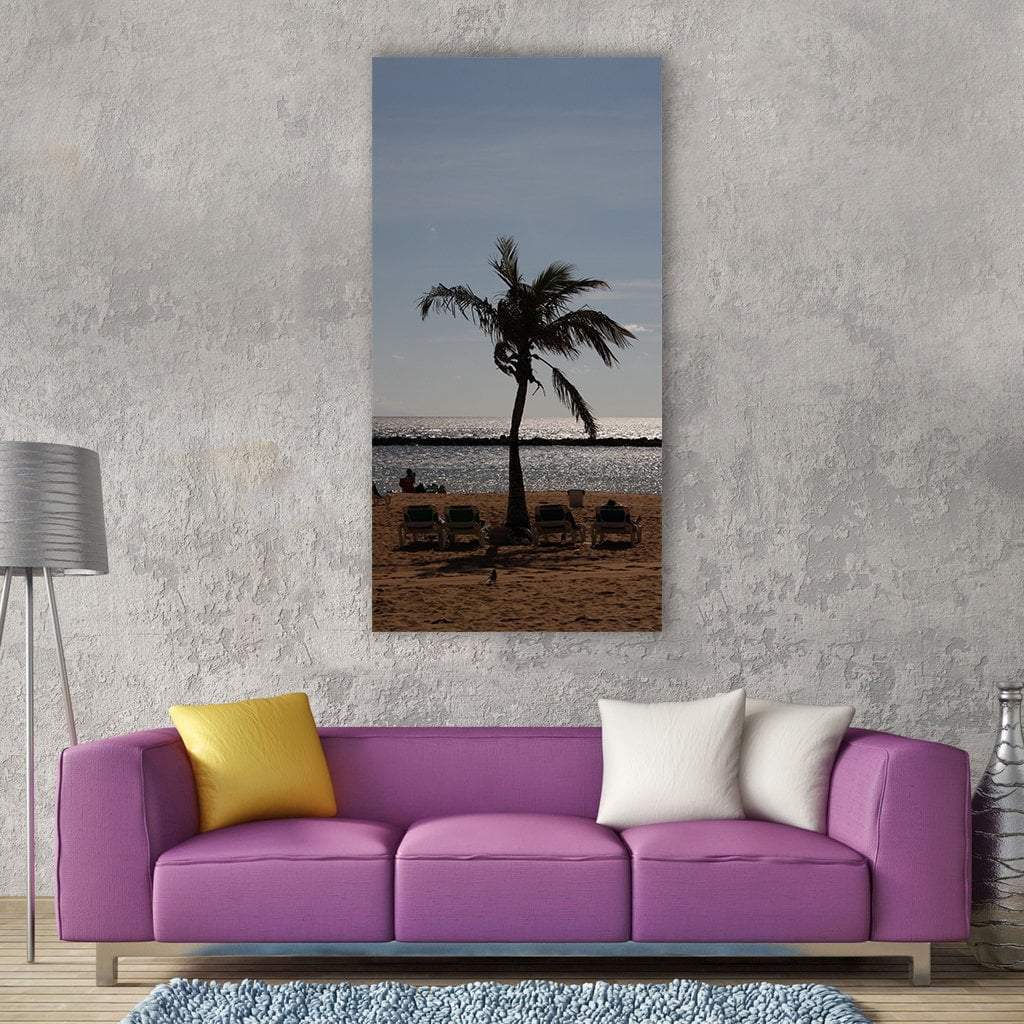 Palm Tree on Sandy Beach Vertical Canvas Wall Art in gray, brown and blue, single vertical panel hung on a wall