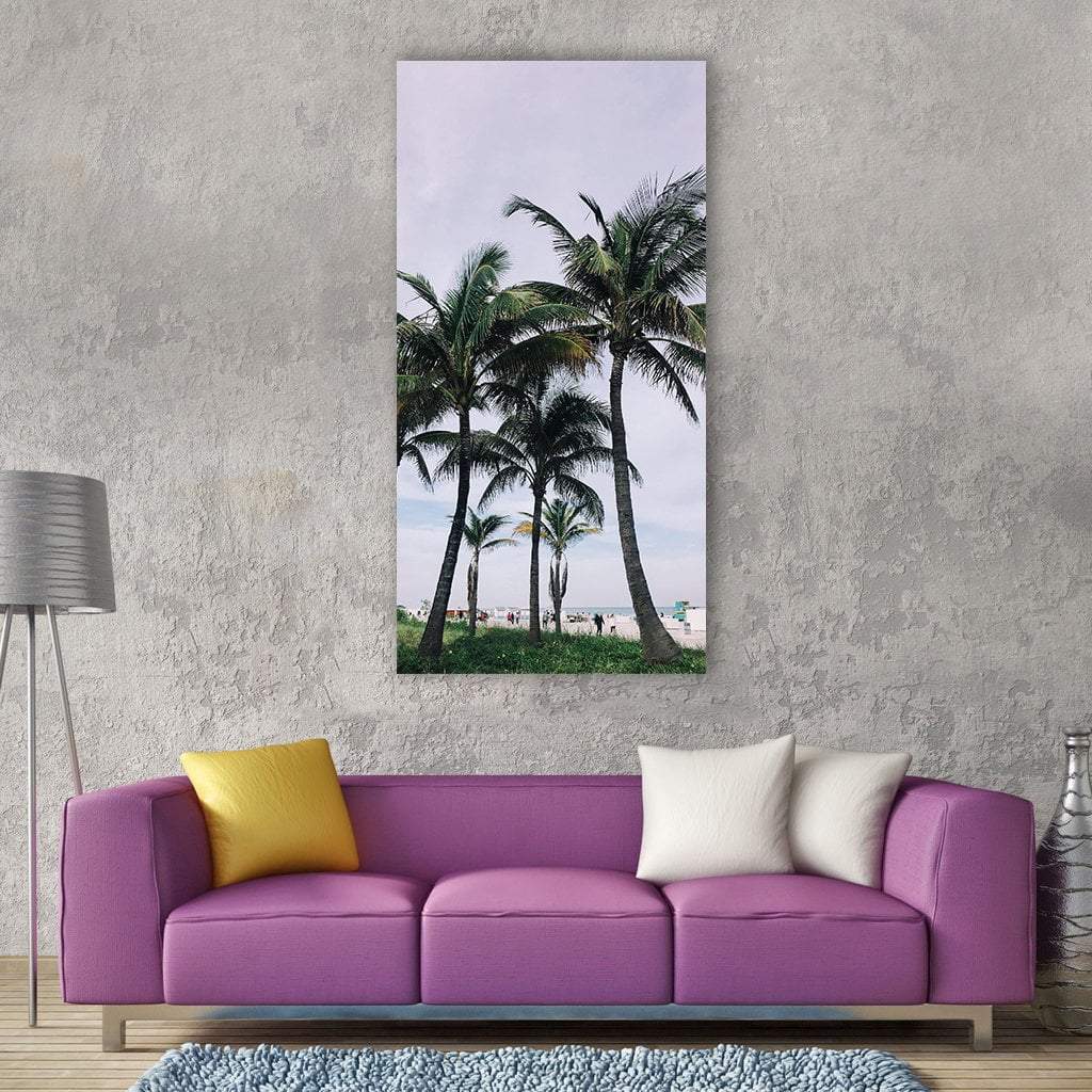 Palm Trees on Tropical Beach Vertical Canvas Wall Art in white, green and blue, single vertical panel hung on a wall