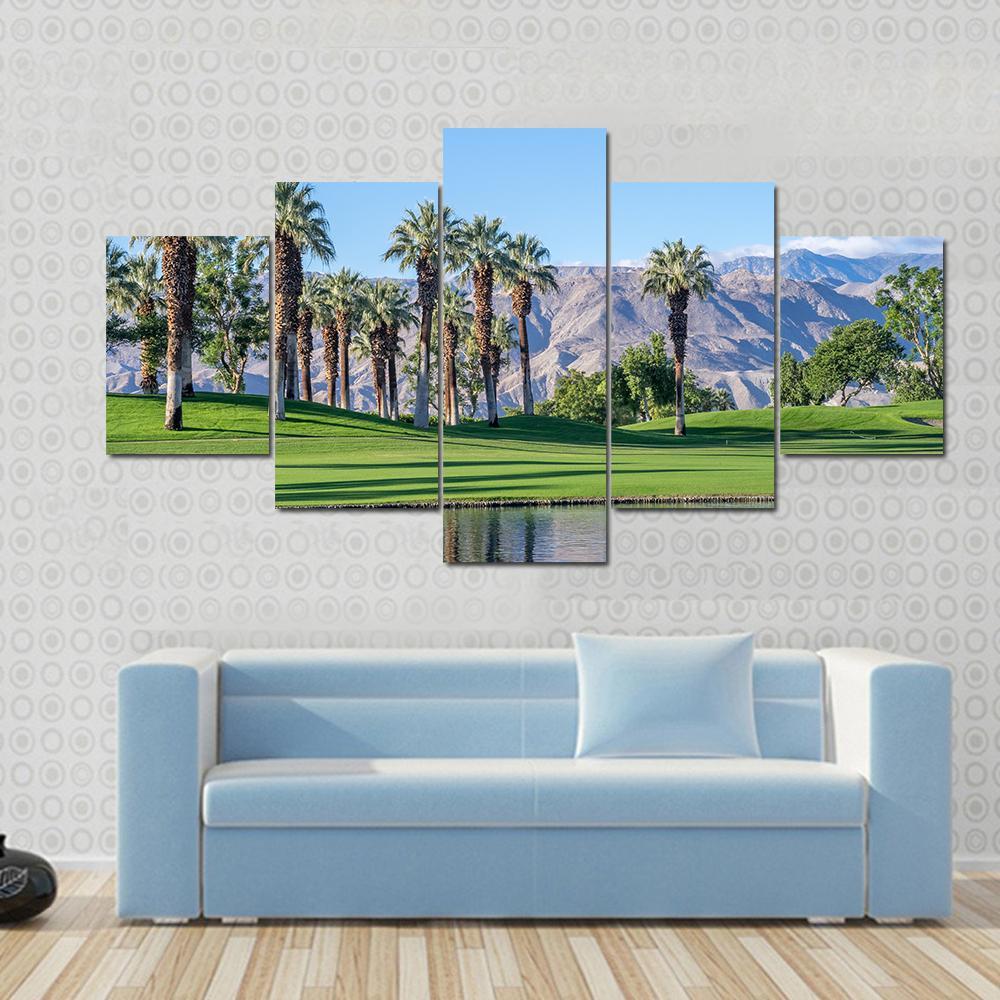 Palms Reflecting in Water Canvas Wall Art in brown, green and blue, 3 panel horizontal set hung on a wall
