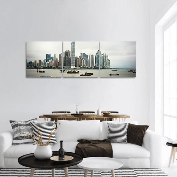 Panama City Skyline Over Harbor Panoramic Canvas Wall Art in white, gray and blue, hung on a wall
