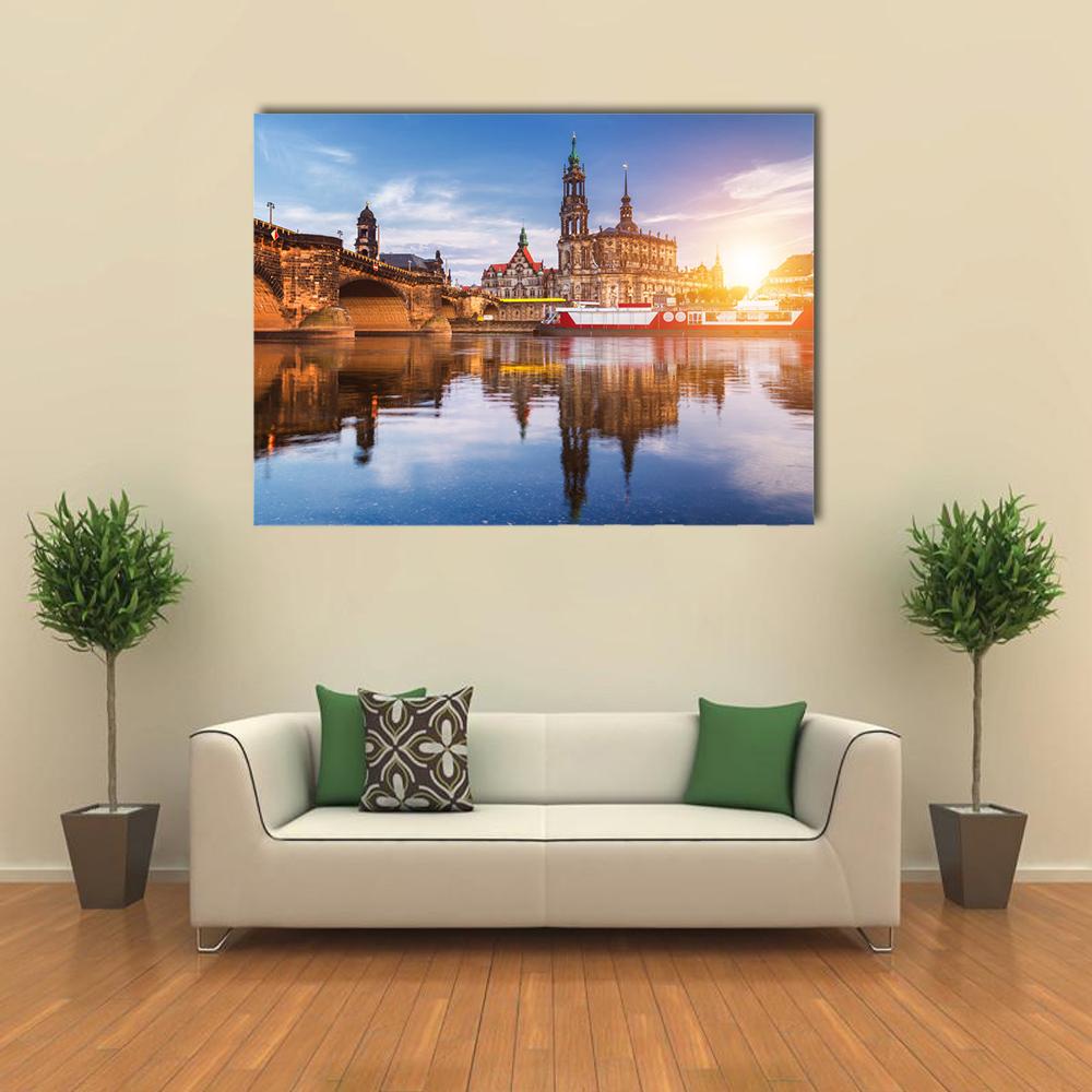 Elbe River Panorama at Sunset Canvas Wall Art in orange, yellow and blue, single panel hung on a wall