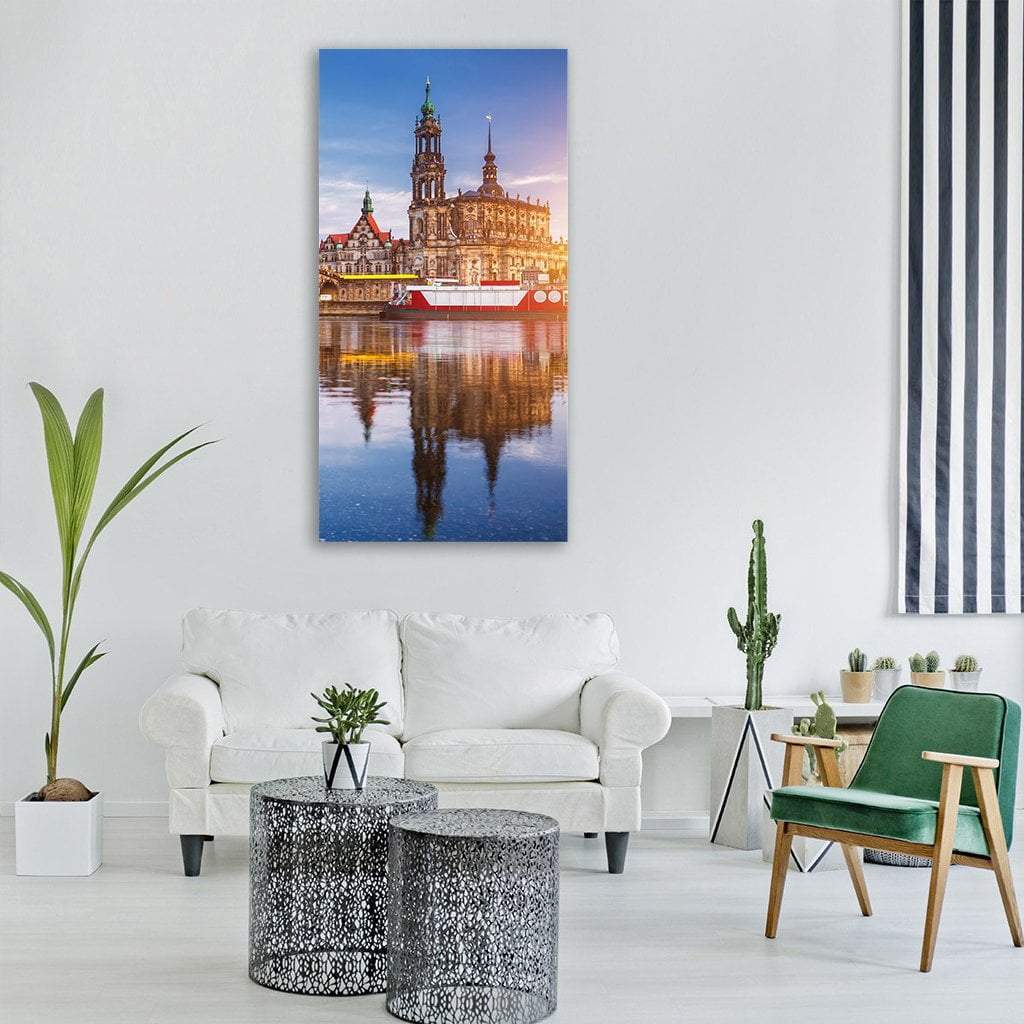 Dresden Cathedral on Elbe River at Dusk Vertical Canvas Wall Art in gold, orange and blue, single vertical panel hung on a wall