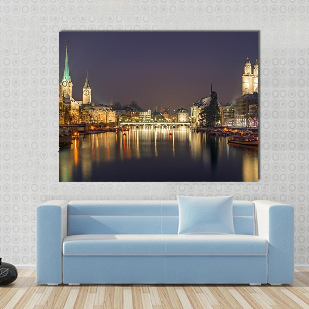 Zurich Winter Night Panorama Canvas Wall Art in black, yellow and blue, single panel hung on a wall