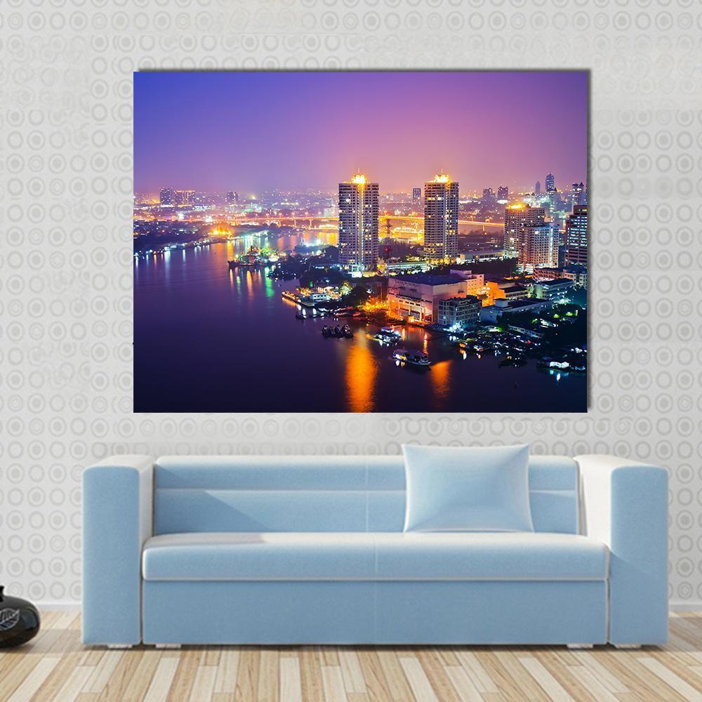 Bangkok Cityscape at Night Canvas Wall Art in gold, blue and purple, single panel hung on a wall