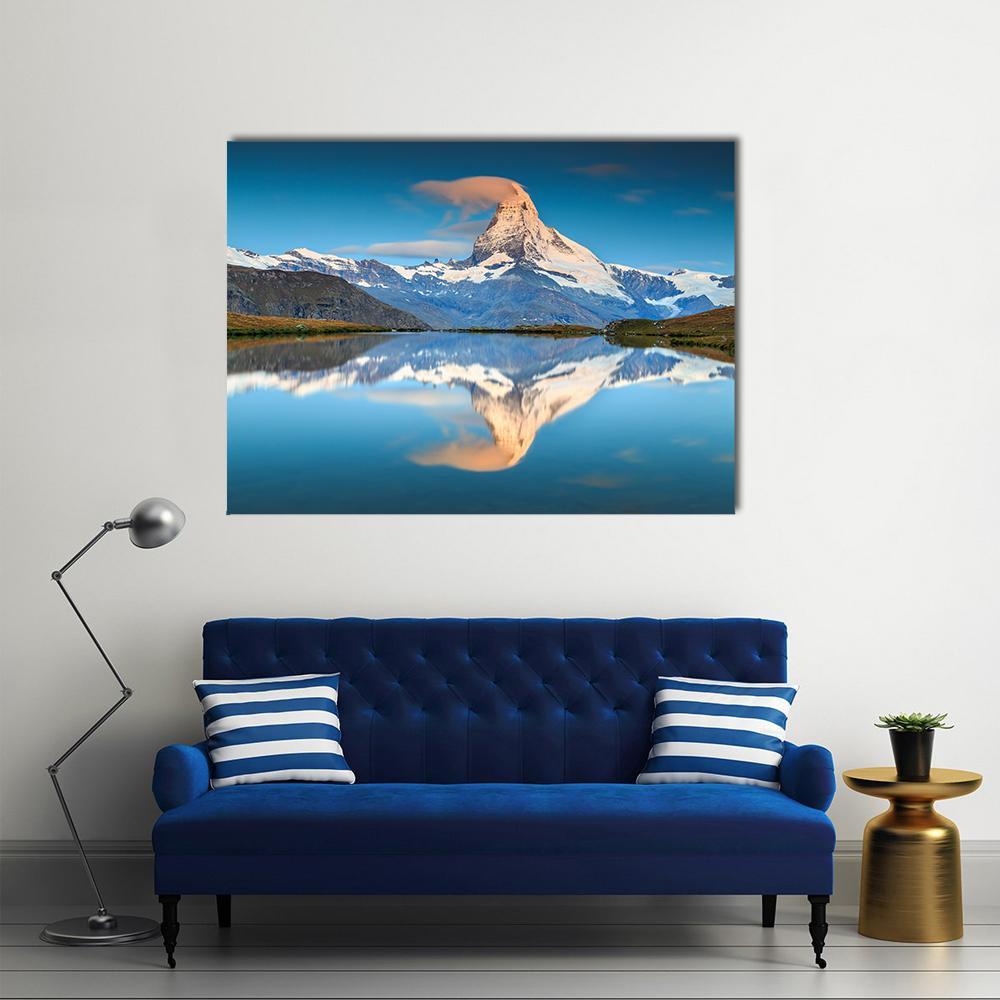 Matterhorn Over Alpine Lake Canvas Wall Art in white and blue, single panel hung on a wall