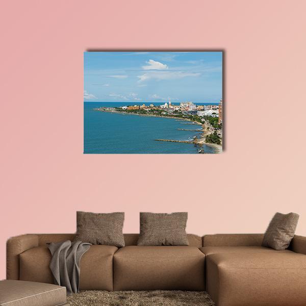 Cartagena Coastal View Canvas Wall Art in white and blue, single panel hung on a wall