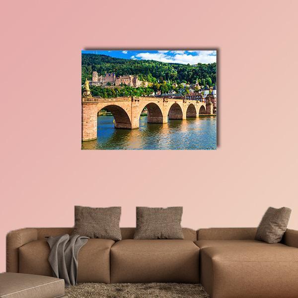Heidelberg Castle and Old Bridge Over the Neckar Canvas Wall Art in brown, green and blue, single panel hung on a wall