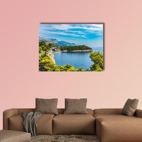 Old Town Bay with Lighthouse, Croatia Canvas Wall Art in green and blue, single panel hung on a wall