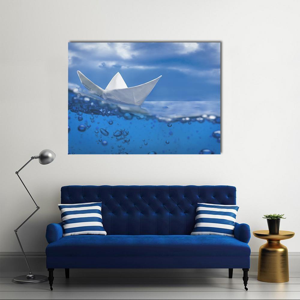 Paper Boat Splash with Bubbles Canvas Wall Art in white and blue, single panel hung on a wall