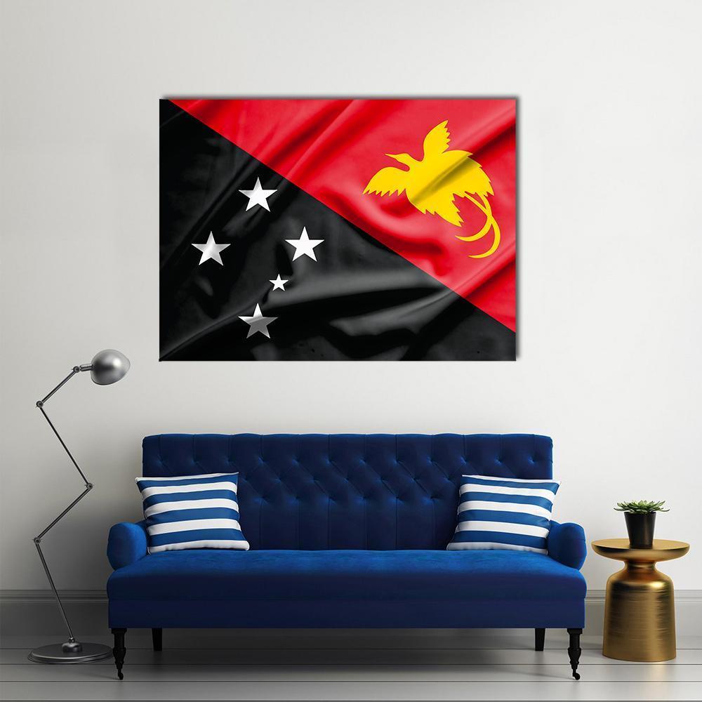 Papua New Guinea Flag Canvas Wall Art in black, red and yellow, single panel hung on a wall