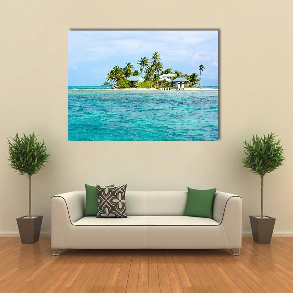 Small Tropical Island with Pier Canvas Wall Art in white, green and blue, single panel hung on a wall