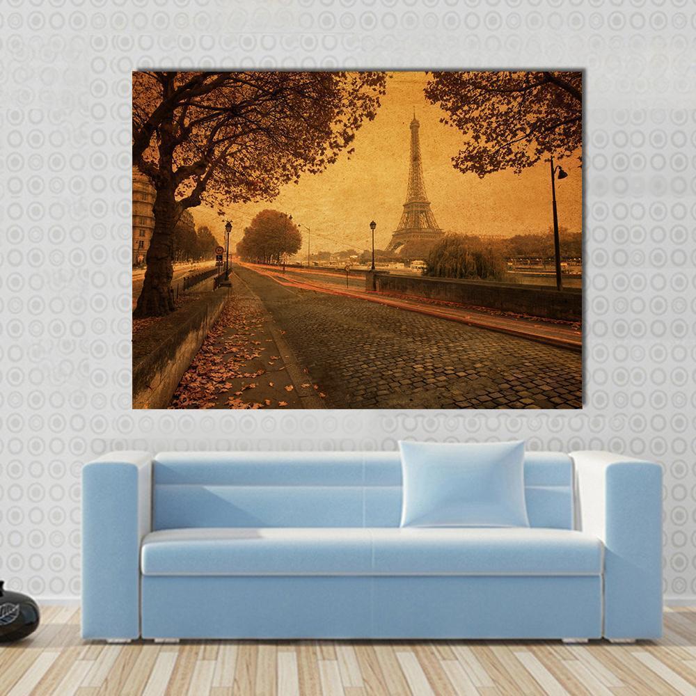 Paris at Dusk with Eiffel Tower Canvas Wall Art in brown, orange and yellow, single panel hung on a wall