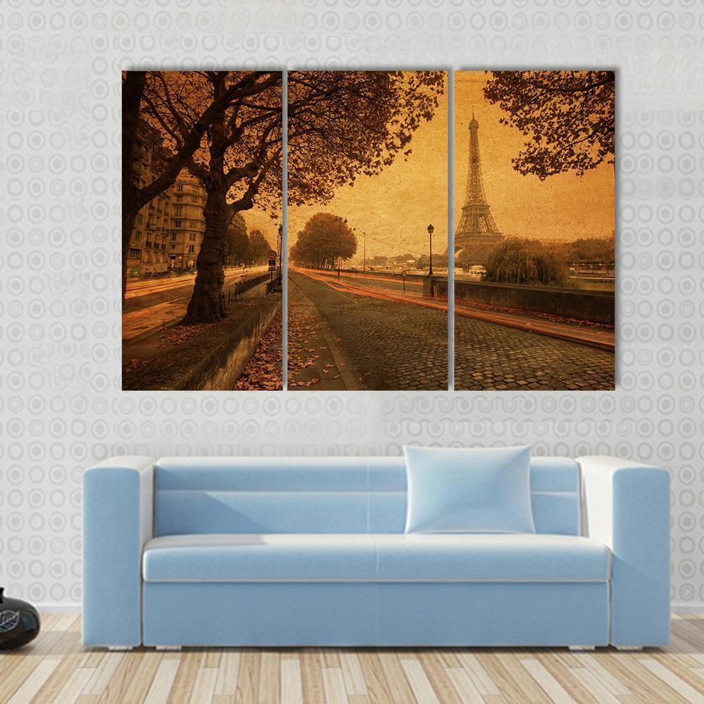 Paris at Dusk with Eiffel Tower Canvas Wall Art in brown, orange and yellow, 4 panel Pop layout hung on a wall