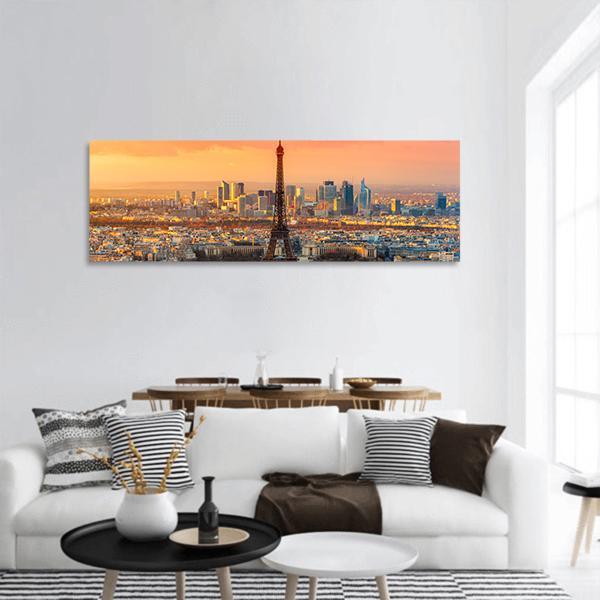 Eiffel Tower at Golden Hour Panoramic Canvas Wall Art in gold, orange and yellow, hung on a wall