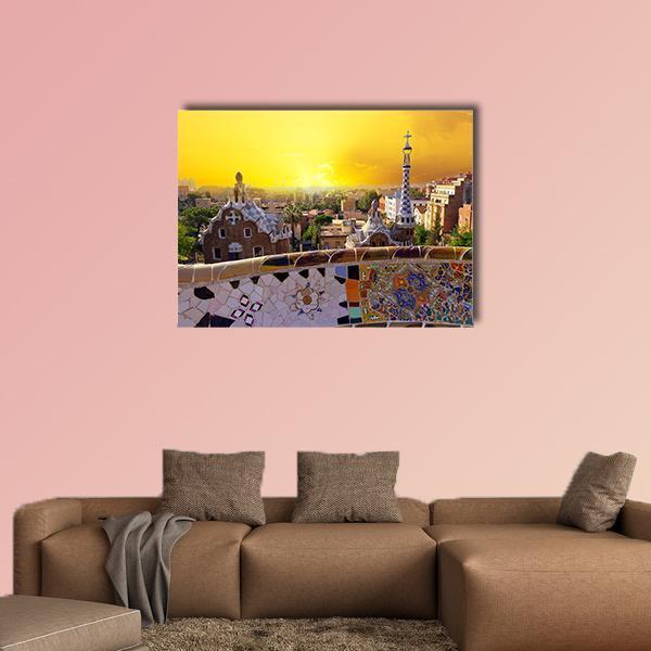 Park Güell Mosaic Bench at Sunset Canvas Wall Art in orange, yellow and multicolor, single panel hung on a wall