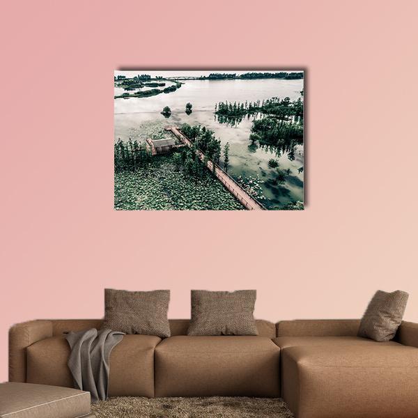 Canadian Park Lake with Boardwalk Canvas Wall Art in white, gray and green, single panel hung on a wall