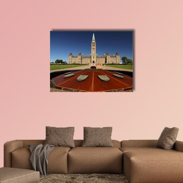 Parliament Hill Fountain and Clock Tower Canvas Wall Art in gray, brown and blue, single panel hung on a wall