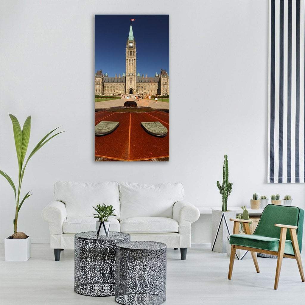 Peace Tower on Parliament Hill Vertical Canvas Wall Art in gray, brown and blue, single vertical panel hung on a wall