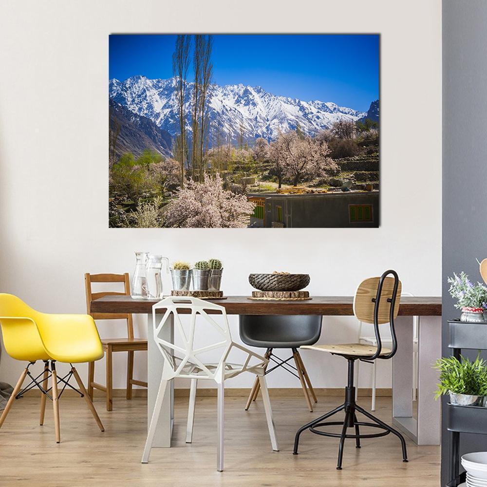 Karakorum Mountains in Clear Blue Sky Canvas Wall Art in white, gray and blue, single panel hung on a wall