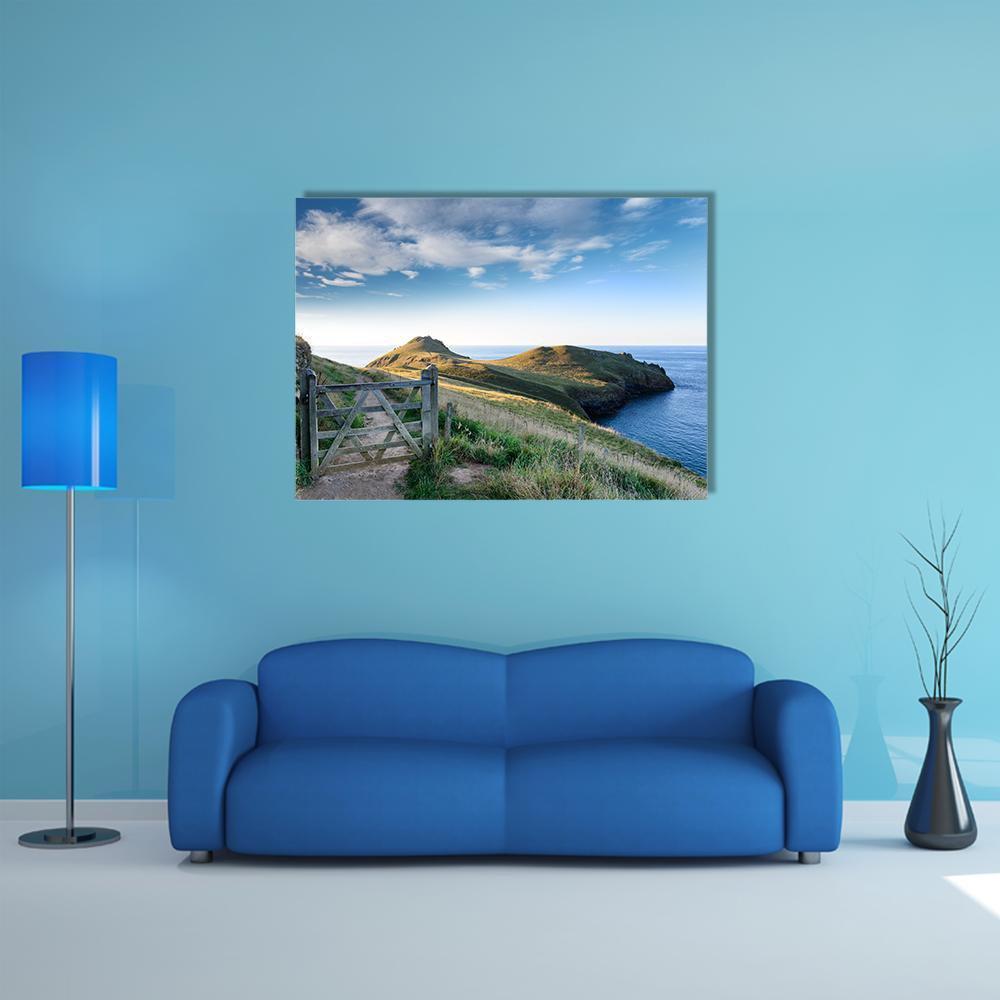 Coastal Path with Wooden Gate Canvas Wall Art in white, green and blue, single panel hung on a wall