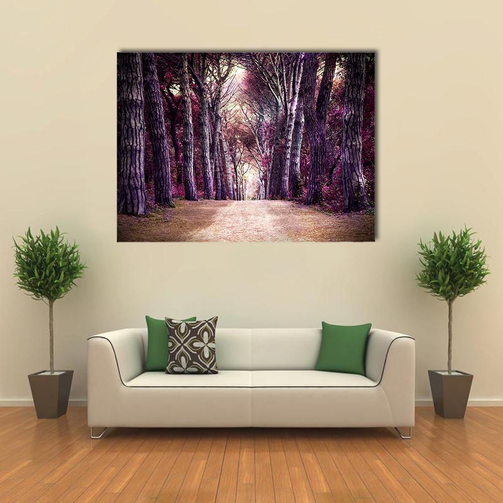 Enchanted Forest Path with Purple Foliage Canvas Wall Art in brown, purple and pink, single panel hung on a wall