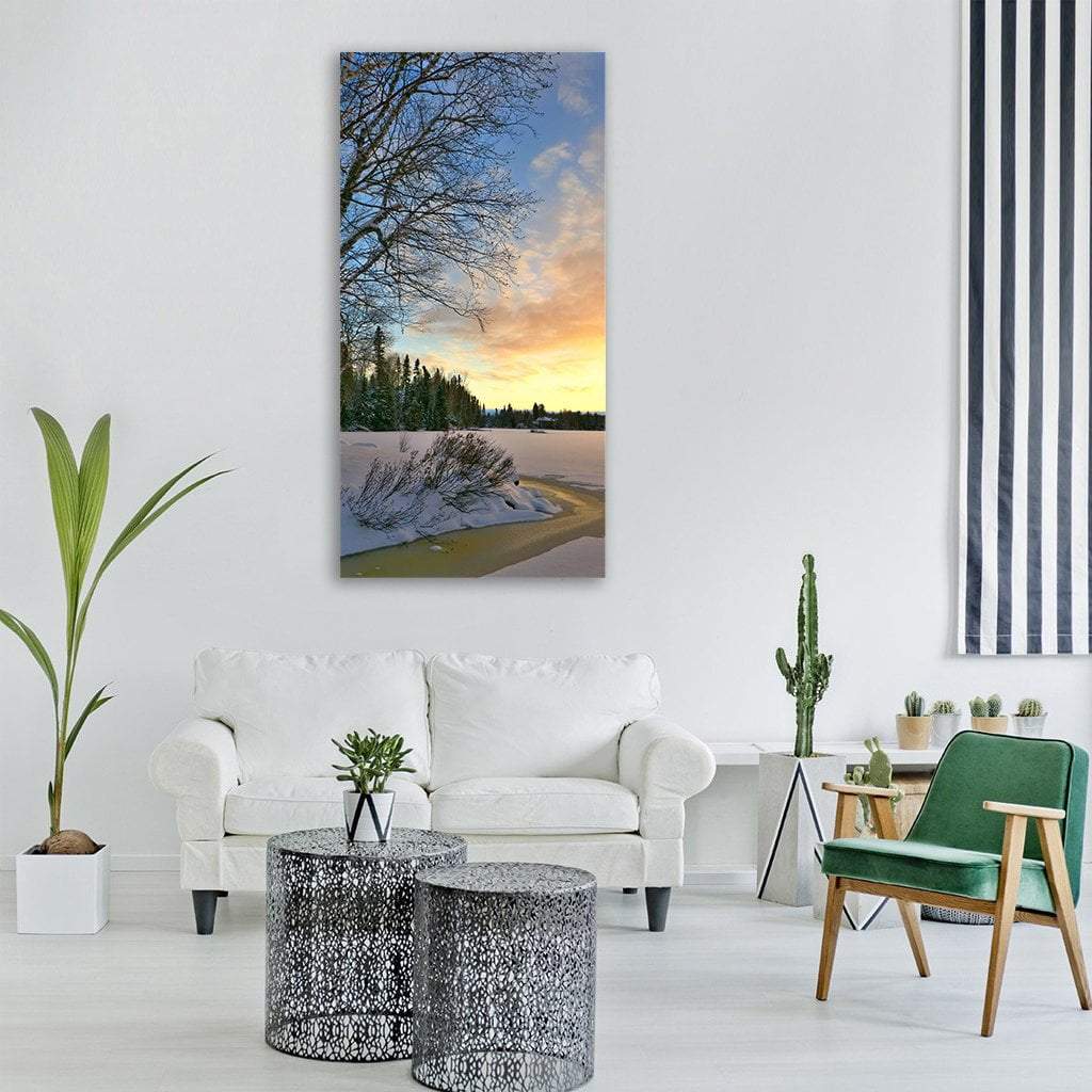 Winter Pathway at Dusk Vertical Canvas Wall Art in white, yellow and blue, single vertical panel hung on a wall