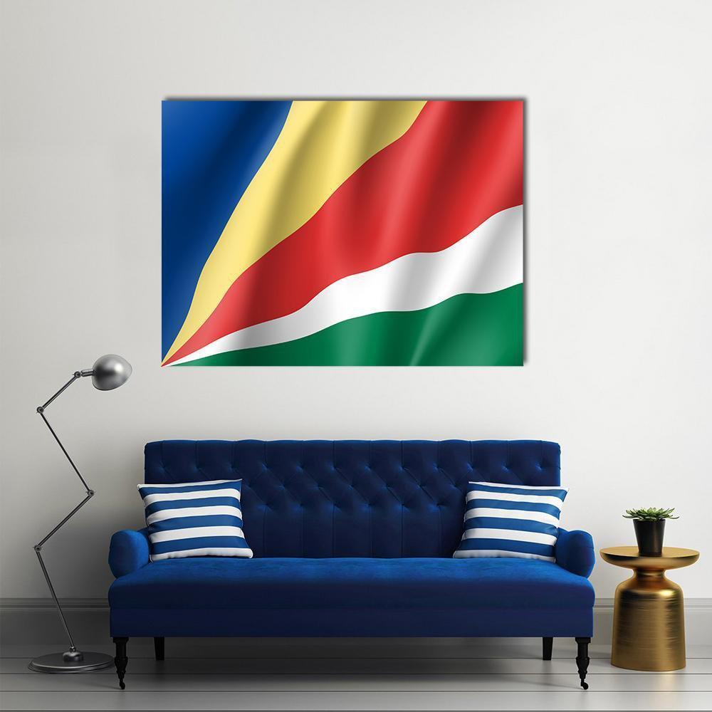 Waving Seychelles Flag Canvas Wall Art in red, yellow and blue, single panel hung on a wall