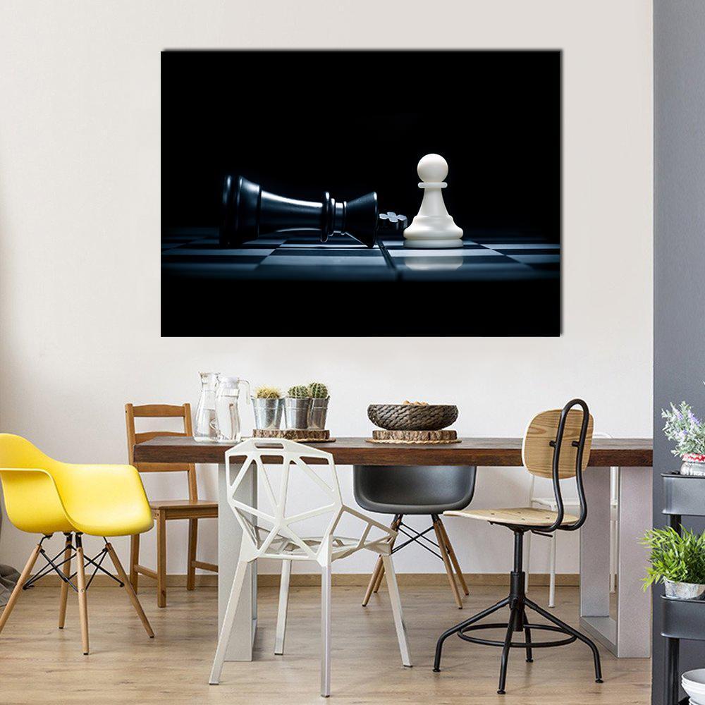 Pawn &amp; the Won King Canvas Wall Art in black and white, single panel hung on a wall