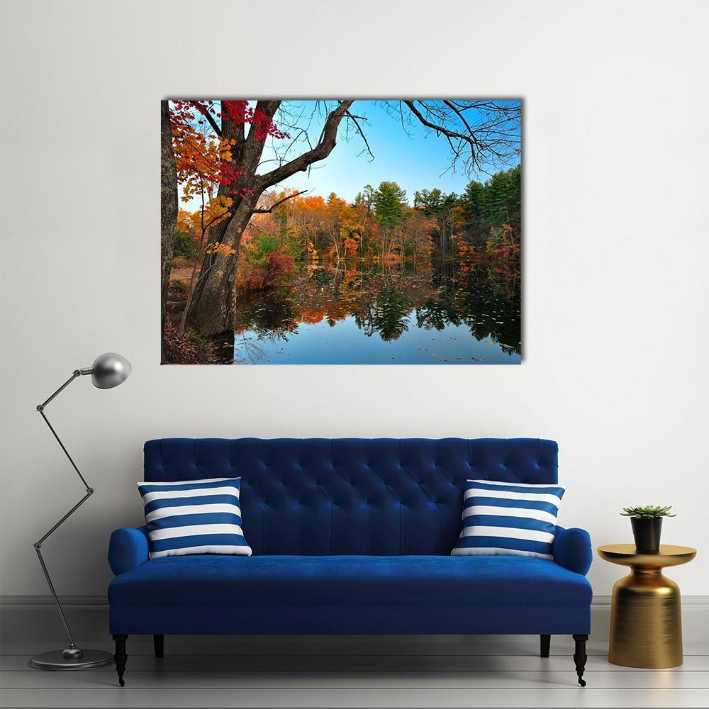 Peak Fall Foliage at Pine Grove Canvas Wall Art in orange, green and blue, single panel hung on a wall
