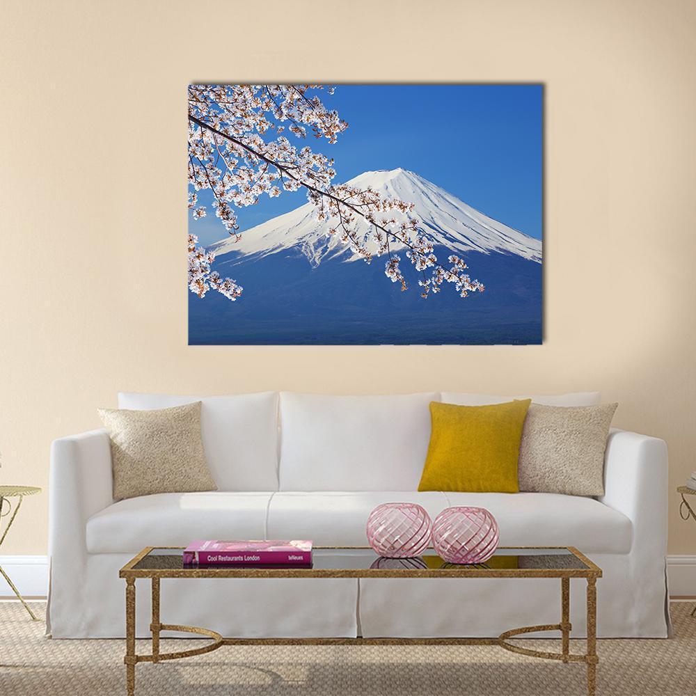 Mount Fuji with Cherry Blossoms in Spring Canvas Wall Art in white and blue, single panel hung on a wall