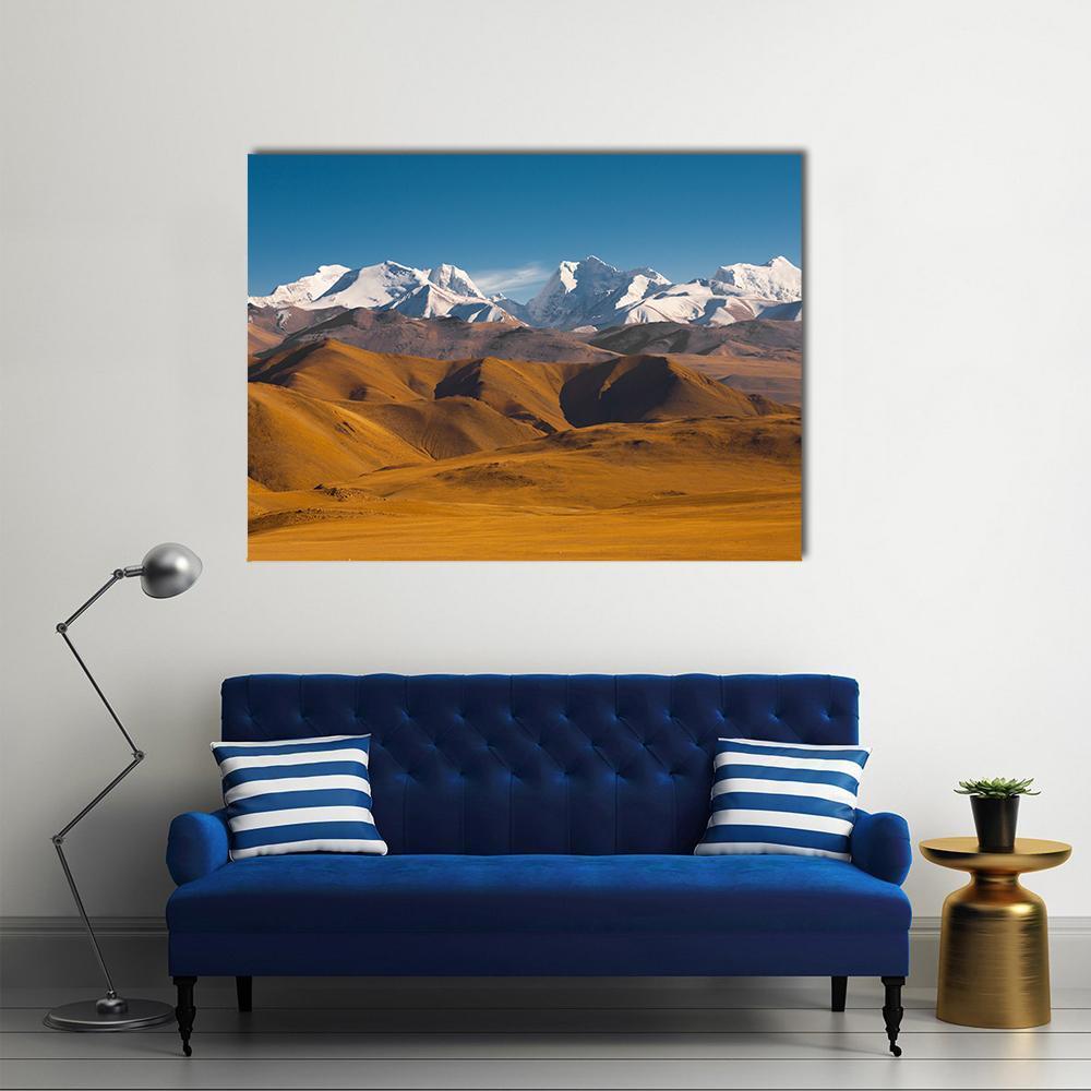 Peaks of the Himalayas Canvas Wall Art in white, brown and blue, single panel hung on a wall