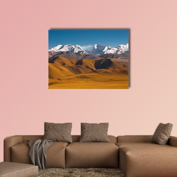 Himalayan Peaks with Snow-capped Golden Hills Canvas Wall Art in white, gold and blue, single panel hung on a wall