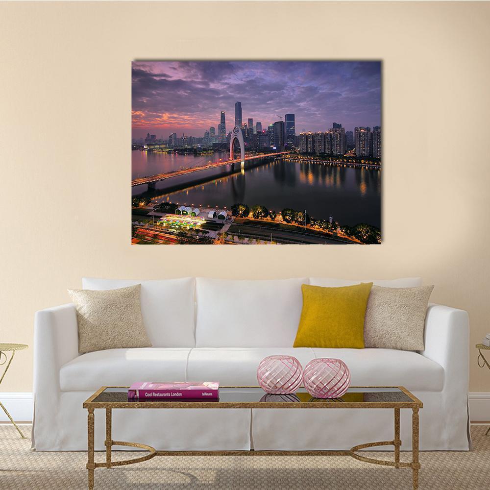 Pearl River New Town Dusk Skyline Canvas Wall Art in black, orange and purple, single panel hung on a wall