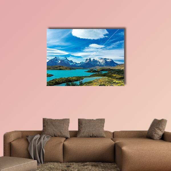 Pehoe Lake and Guernos Mountains Canvas Wall Art in white, green and blue, single panel hung on a wall