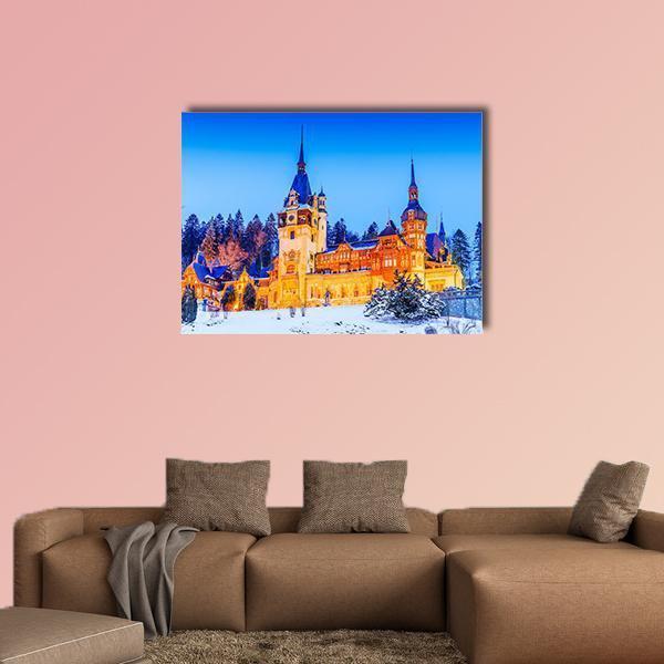 Peles Castle in Sinaia Winter Evening Canvas Wall Art in white, orange and blue, single panel hung on a wall