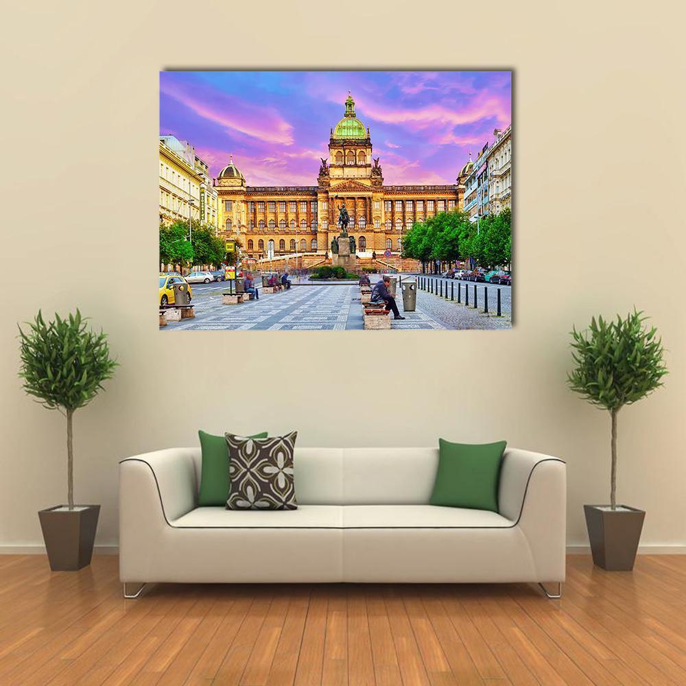 People on Wenceslas Square at Night Canvas Wall Art in yellow, blue and purple, single panel hung on a wall