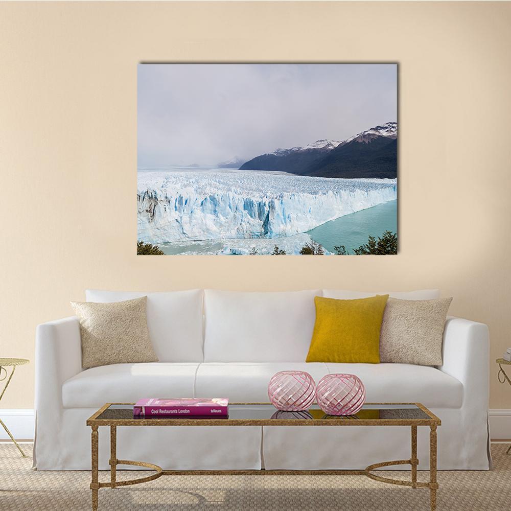 Perito Moreno Glacier Landscape Canvas Wall Art in white, gray and blue, single panel hung on a wall