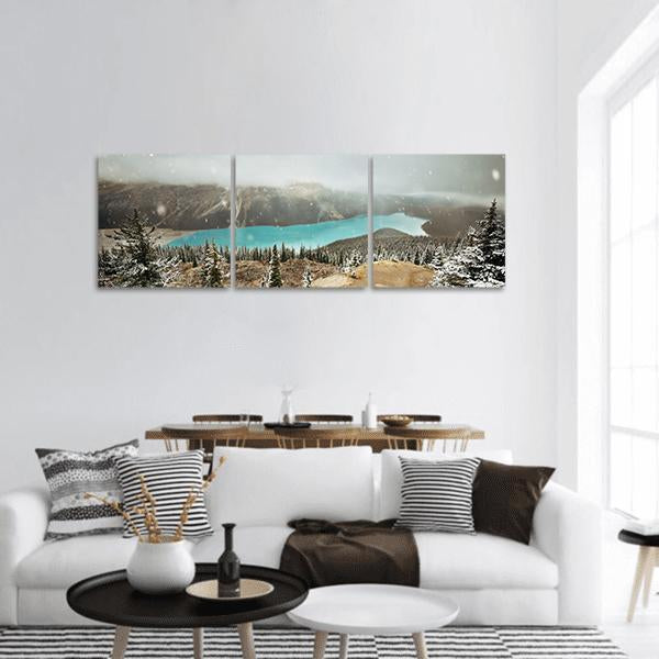 Peyto Lake in Winter Panoramic Canvas Wall Art in white, gray and blue, hung on a wall